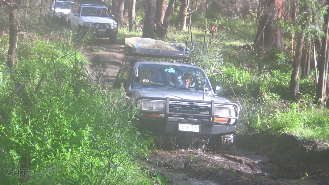 11-Manky blazes through the muddy Wentworth River.jpg